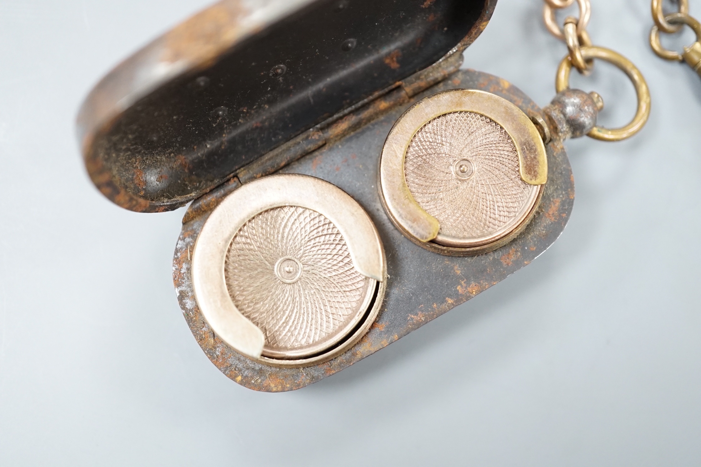 A 9ct gold albert, with base metal sovereign case attached, chain 27 grams.